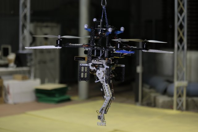 Quadrotor plus robotic arm